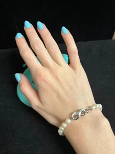 Tiffany & Co. 925 1999 Sterling Silver Infinity Clasp White Pearl Bracelet 7.0" - Picture 1 of 8