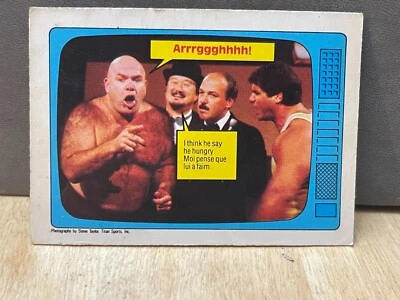 1985 O-Pee_Chee GEORGE THE ANIMAL STEELE GENE OKERLUND Superstars Speak card #65 - Image 1 of 2