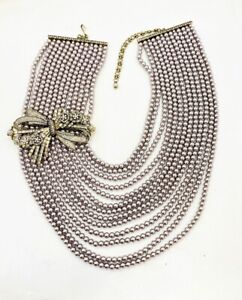 Heidi Daus Best In Bows Cream Crystal Accented 13 Strand Necklace and box