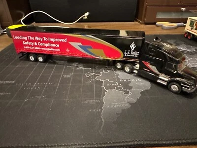 SPECCAST 1/64 BLACK/RED J.J. KELLER VOLVO 770 W/ 53' TRAILER SEMI TRUCK NEW - Image 1 of 4