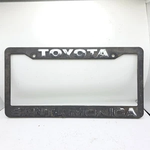 Marco de matrícula de plástico negro delantero o trasero Toyota Santa Monica California - Imagen 1 de 2