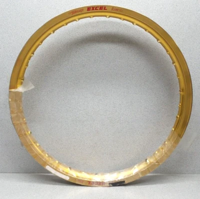 WPS BG4100 EXCEL TAKASAGO FRT MX RIM GOLD SUZUKI YAMAHA KAWASAKI 20X1.85 36 NOS - Image 1 of 4