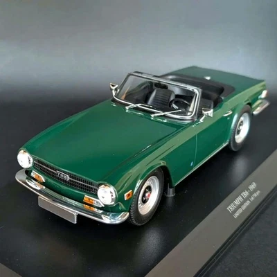 Minichamps 1/18 Triumph TR6 1969 dunkelgrün LHD limitiert 750 Teile Modellauto - Bild 1 von 4