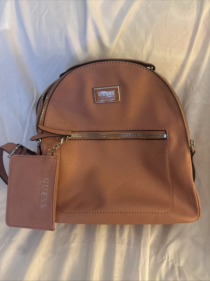Mochila para mujer GUESS rosa claro talla mediana con billetera Foto 1 de 4