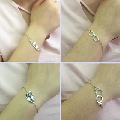 BRACCIALETTO CAVIGLIERA CATENA SOTTILE REGOLABILE GUFO FRECCIA DONNA FOGLIA - Immagine 1 di 4