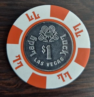 Moneda de $1 Lady Luck Casino Las Vegas en ficha de casino central Foto 1 de 3
