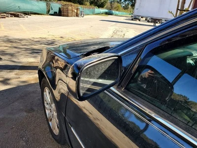 Espejo retrovisor lateral izquierdo Cadillac DTS 2009 OEM negro con intermitente y BSM Foto 1 de 4