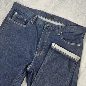 Pantalones de mezclilla elásticos Uniqlo para hombre 36x32 azules ajustados tiro medio recto Kaihara - Imagen 1 de 16