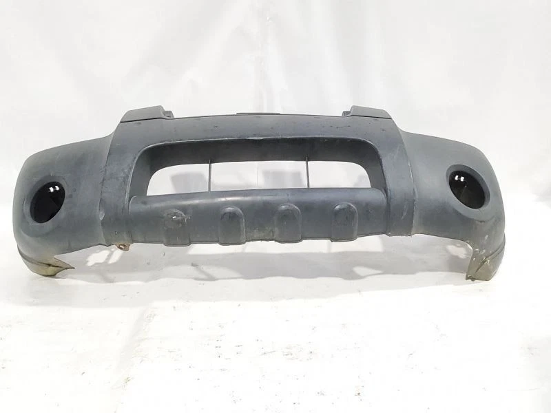 Parachoques delantero Nissan Frontier 2001 2002 2003 2004 OEM gris texturizado arañazos Foto 1 de 4