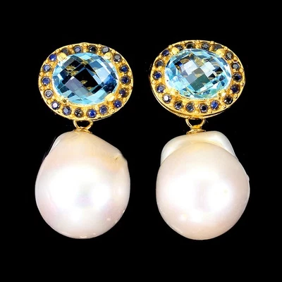 Orecchini in argento sterling 925 topazio blu ovale 10x8 mm perla del Mozambico - Immagine 1 di 4