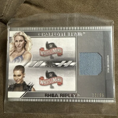 2021 Topps WWE Undisputed Rhea Ripley & Charlotte Flair Mat Relic 33/99 - Image 1 of 2