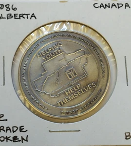 Yellowknife 1986 nuevo con etiquetas ficha de dólar juvenil Helping sin circular - Imagen 1 de 2