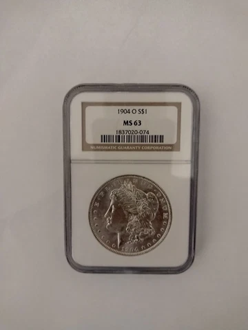 1904 O Morgan Silver Dollar NGC MS 63 Cover