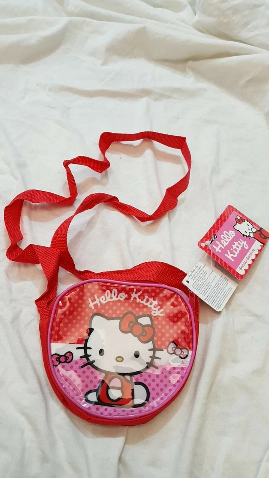 Hello Kitty - Sanrio - Tracollina in PVC Rossa 12x15- Sanrio - Nuovo - Immagine 1 di 4