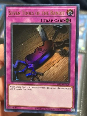 Yu-Gi-Oh! Seven Tools of the Bandit MRD-EN129 Ultra Raro 1er (25 Aniversario) Foto 1 de 3