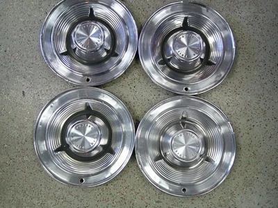 Pontiac Bonneville Catalina 1962 14" cubiertas de rueda giratorias OEM - Juego/4 Foto 1 de 4