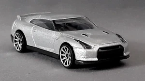 Nissan GT-R Hot Wheels Plateado '09 Nuevos Modelos Sintonizador 10 Radios JDM Como Nuevo Suelto - Imagen 1 de 10