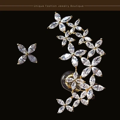 Precioso conjunto de aretes brazalete estrella piedra marquesa diamante simulado relleno de oro de 18k Foto 1 de 4