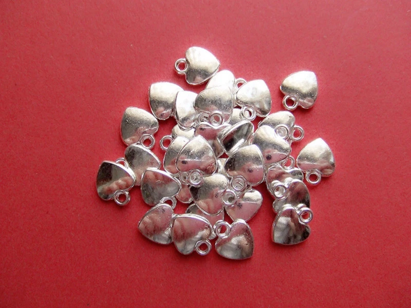 10pz ciondoli  charms Cuore 12x10mm colore argento chiaro bijoux - Immagine 1 di 1