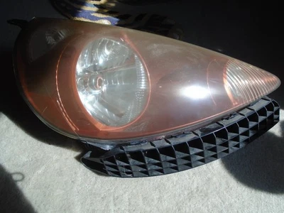 Фара пассажирская Honda Fit 33101-SLN-A01ZH огненно-оранжевая 2007 2008 сборка - Изображение 1 из 4