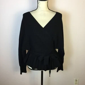 Neu mit Etikett Umgee Pullover Größe L Damen schwarz Strick Babydoll V-Ausschnitt Wickeloptik Schößchen Taille binden - Bild 1 von 13