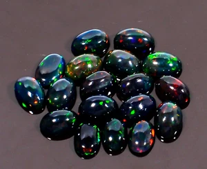 Lote de 18 piezas de piedras preciosas de ópalo etíope negro natural forma ovalada 5 quilates 6X4X3 - Imagen 1 de 3