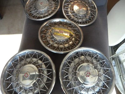 Cadillac DeVille Seville Fleetwood 1975-1985 tapacubos de cable/radios de 15" (5) - bueno Foto 1 de 4