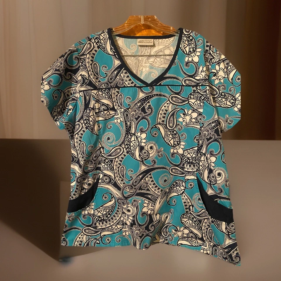 Médicos UA para mujer azul marino verde azulado talla XL cuello en V bolsillos delanteros manga corta Foto 1 de 4