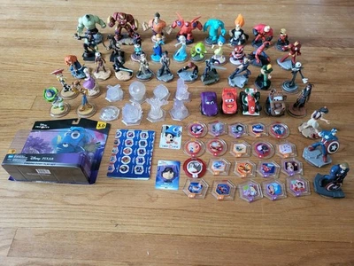 LOTE 41 Figuras Disney Infinity + Póster + 8 Juegos de Cristal + 20 Discos de Potencia + Foto 1 de 4
