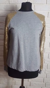 Sudadera con mangas de lentejuelas talla 8 UK ex de ASOS - Imagen 1 de 3