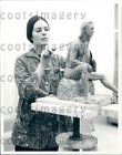 Woman in Paisley Shirt Paints Scaled Sculpture Ewing Galloway Press Photo