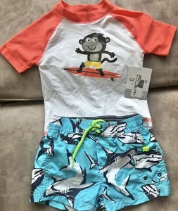NEW CARTERS BABY BOYS 2 PIECE SWIM SHORTS RASH GUARD SET MONKEY SURFING 6-9M - Picture 1 of 4
