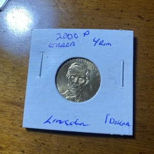 2000 P Error L/Rim LINCOLN 1 Dollar Coin - Picture 1 of 4