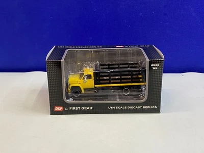 DCP FIRST GEAR 1/64 SCALE YELLOW GMC 6500 SINGLE AXLE STAKE TRUCK 60-0966 - Image 1 of 4