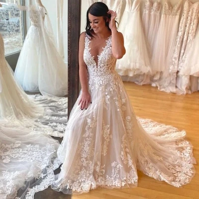 Vestidos de novia de playa cuello en V boho tren sin mangas vestidos de novia florales Foto 1 de 4