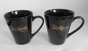 Par de tazas de café cónicas de cerámica negra con logotipo de Tia Maria - Imagen 1 de 5