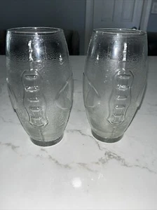 Lot Of (2) FOOTBALL Shaped Drinking Glasses Oval NFL Cups Mugs Beer glass 23 Oz - Picture 1 of 3
