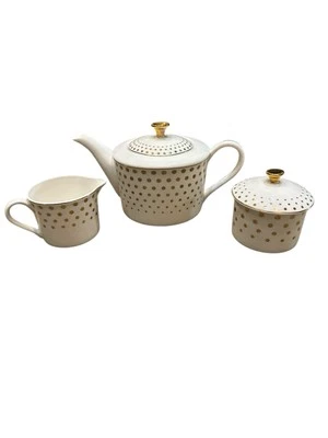 Tetera Grace's Teaware con crema y azucarero blanca con lunares dorados Foto 1 de 4