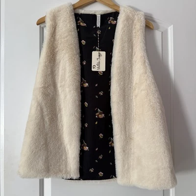 Chaleco Matilda Jane Reversible Snow Way Crema Negro Floral Imitación Piel Mujer Pequeño Foto 1 de 4