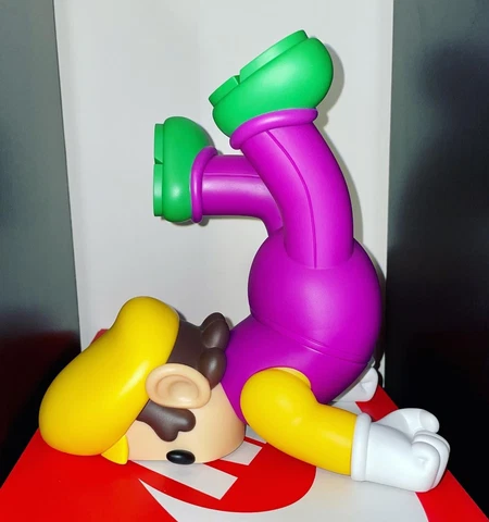 Super Crash Bro 9.5" Vinyl Figure Josh Divine Yellow/Purple Wario Cover