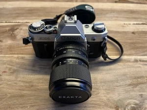 Canon AE1 Analog Spiegelreflexkamera mit Objektiv - Bild 1 von 12