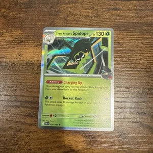 Team Rocket's Spidops 020/182 Sv10: Destined Rivals Holo - Picture 1 of 2