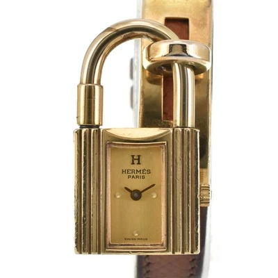 Reloj HERMES Kelly chapado en oro/cuero esfera dorada cuarzo reloj para damas R#143446 Foto 1 de 4