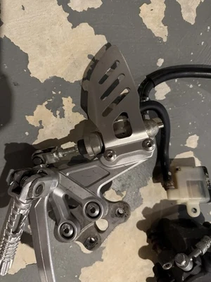 2007 2008 suzuki gsxr1000 RIGHT REARSET REAR SET BRAKE CALIPER MASTER CYLINDER - Image 1 of 3