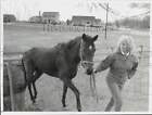 1992 Press Photo Liz Sanderter pulls a horse at Pine Lakes Stables in Mint Hill