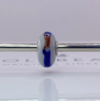 Cuentas de vidrio retiradas Trollbeads rayas azules y rojas Foto 1 de 4