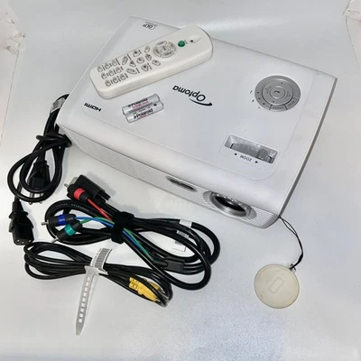 Optoma MT300 MovieTime DLP Projector 2400 Lumens 720p HDMI Remote Cables White - Image 1 of 4