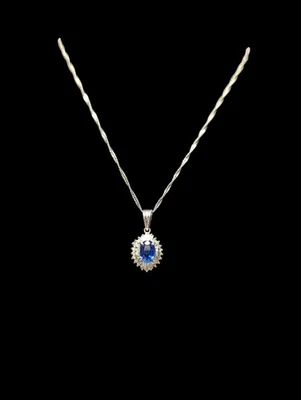 Collar colgante de zafiro azul con diamantes en platino Foto 1 de 4