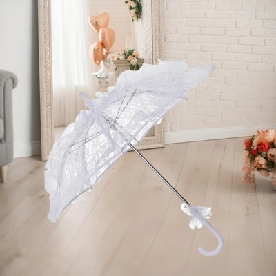 Sombrilla de encaje Sombrilla de boda para duchas nupciales Escenario Escenario Fiesta del té Foto 1 de 2