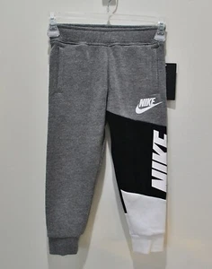 NEU MIT ETIKETT JUNGEN NIKE CARBON MELIERT SWEATPANTS FLEECEHOSE GR. XS (4) - Bild 1 von 5